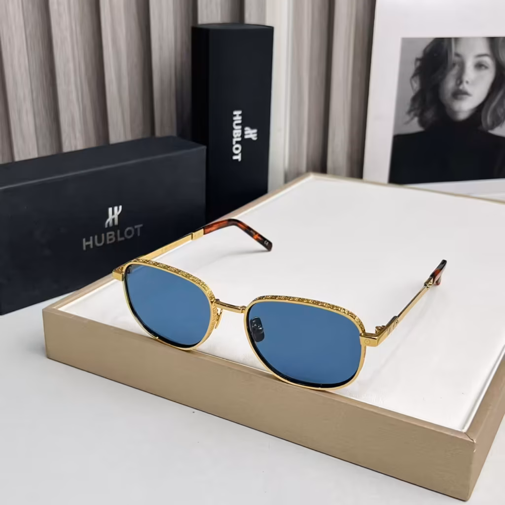 Hublot Gold Engraved Blue Oval Sunglasses